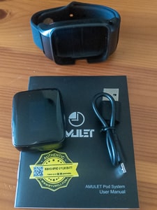 Picture showing the contents of the Uwell Amulet Pod Watch innovative e-cigarette system