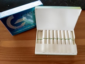 An opened box of Original Cigoo Sticks